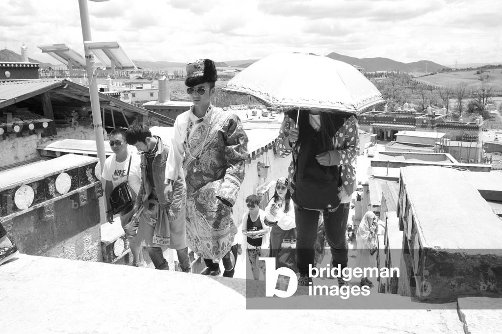 Chinese tourists in China Shangri La (b/w photo)