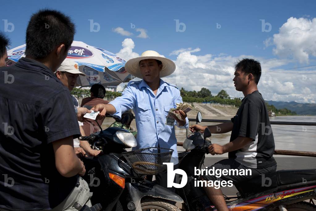 Ferry crossing the Mekong river in China (photo)