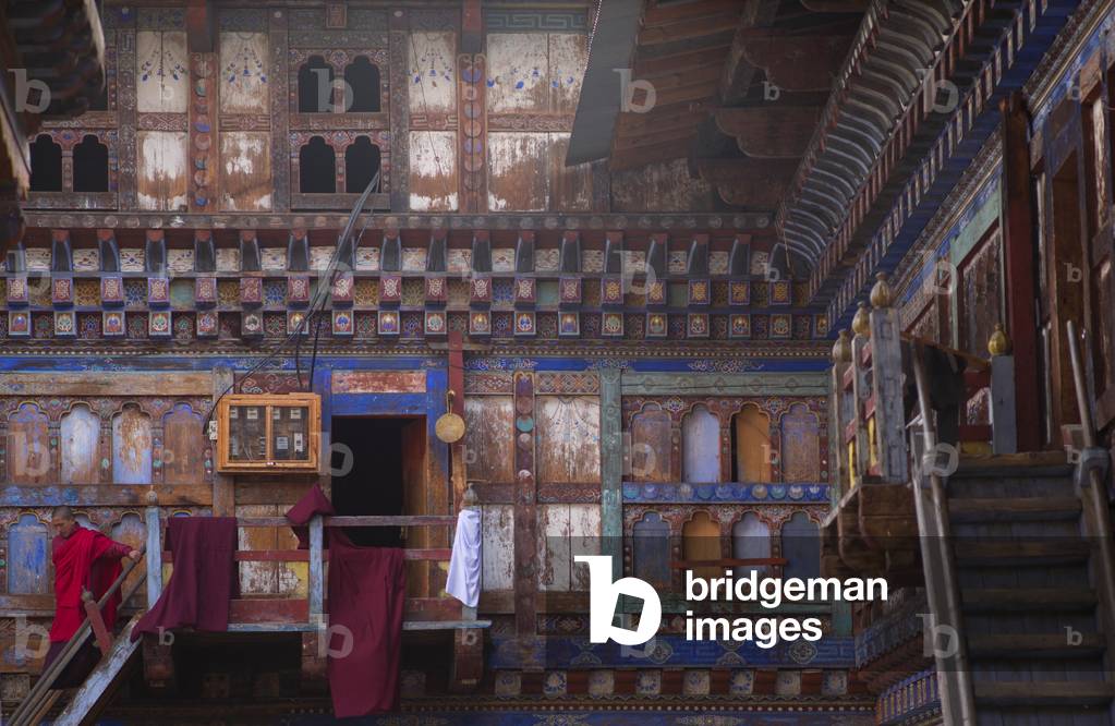 Monk in the monastery, Bhutan (photo)