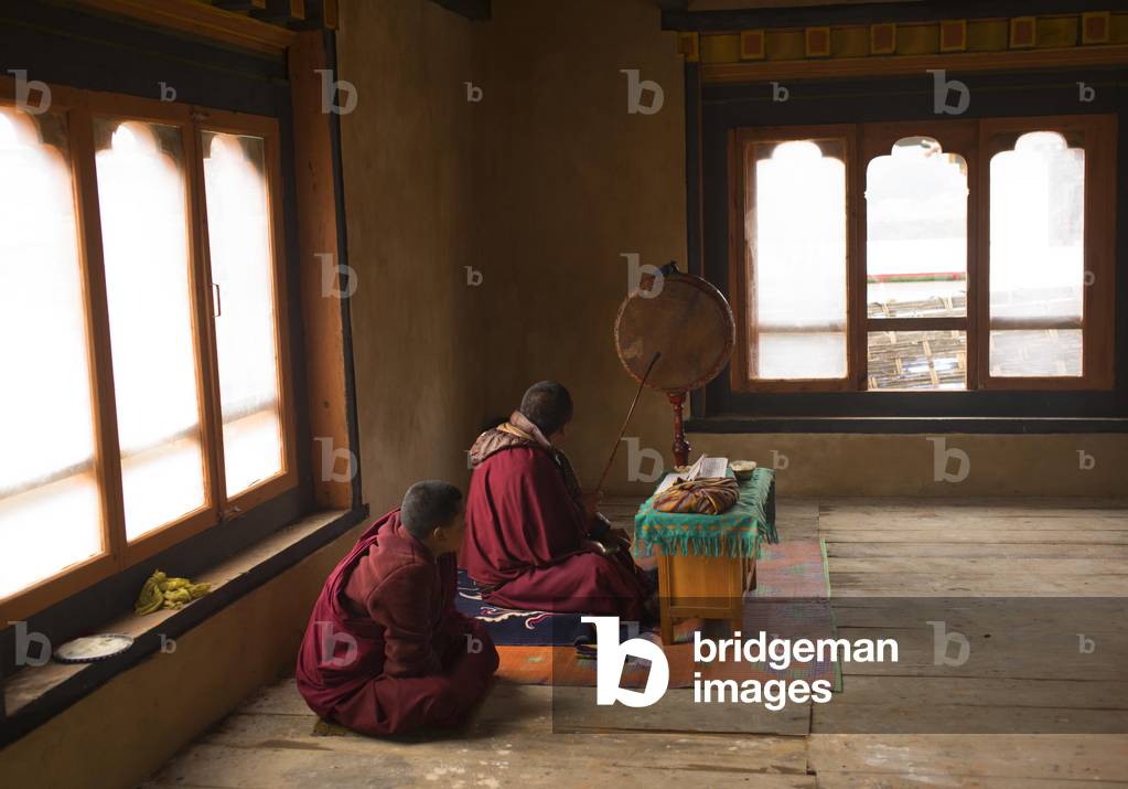Monks in prayer, Bhutan (photo)