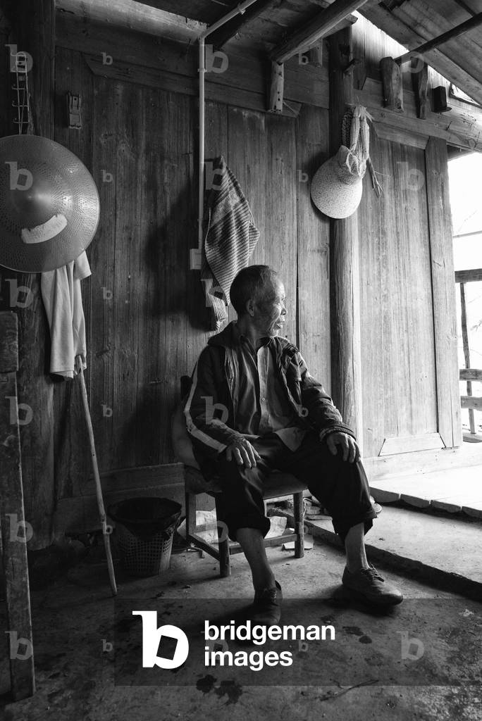 Farmer in his house nr Yibin, China (b/w photo)