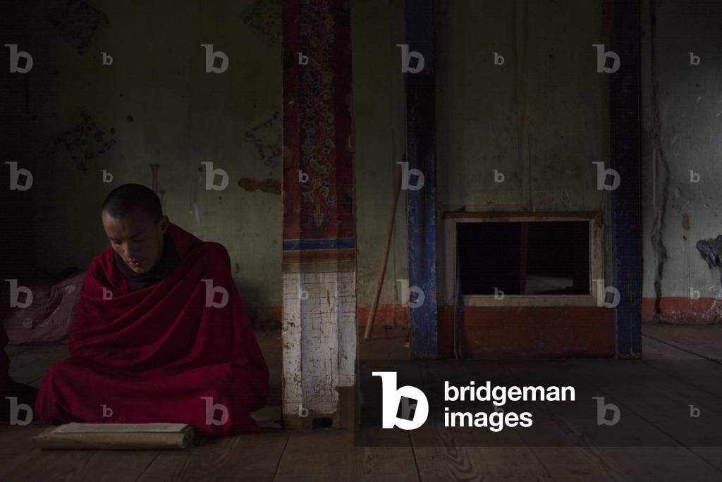 At prayer, Bumthang, Bhutan (photo)