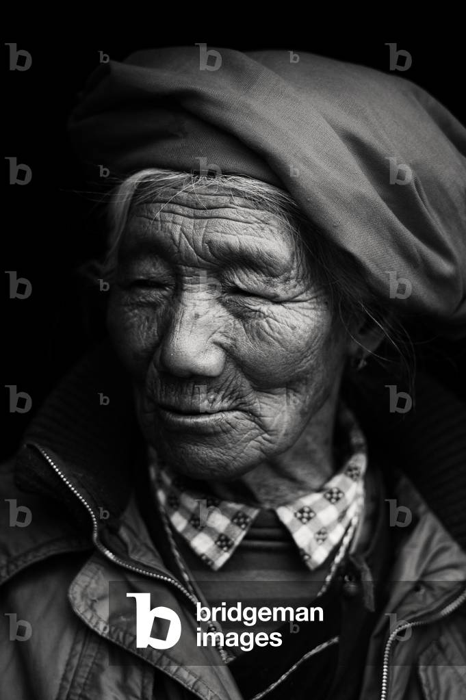 Portrait of lady, Yunnan, China (b/w photo)