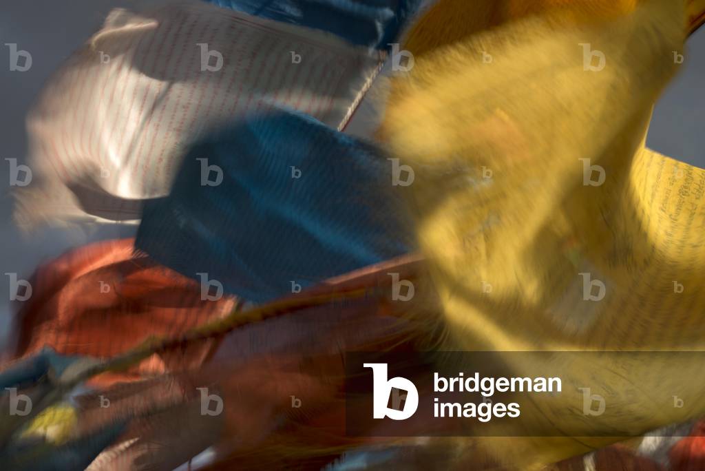 Prayer flags blowing in the wind, China (photo)