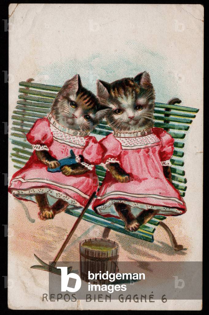 Well-earned rest. Animals in human-like poses. Cats on a bench with a pickaxe, bucket, and doll. Postcard. Chromo, early 20th century.