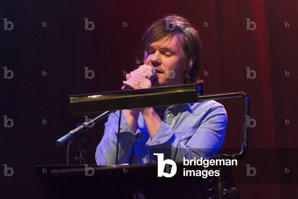 Roddy Woomble, Scottish singer, songwriter and writer, performing at the Roaming Roots Revue Celtic Connection,s 2014 (photo)