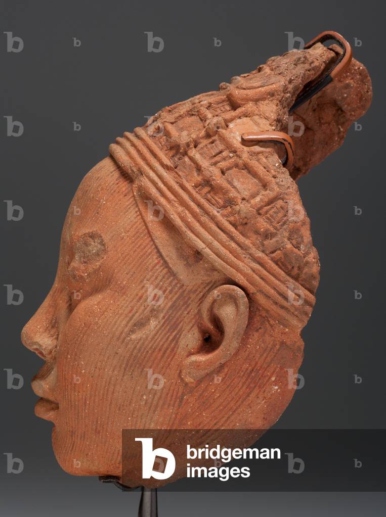 Head, possibly a King (terracotta with residue of red pigment & traces of mica)