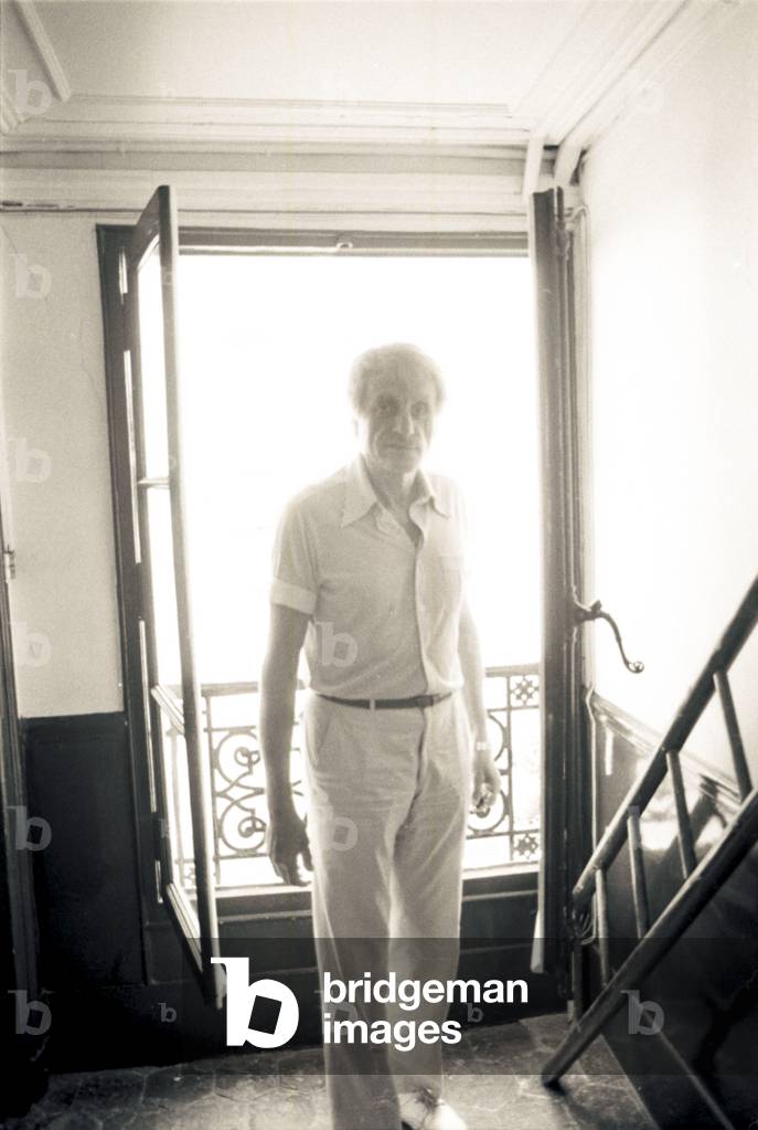 Iannis Xenakis standing at