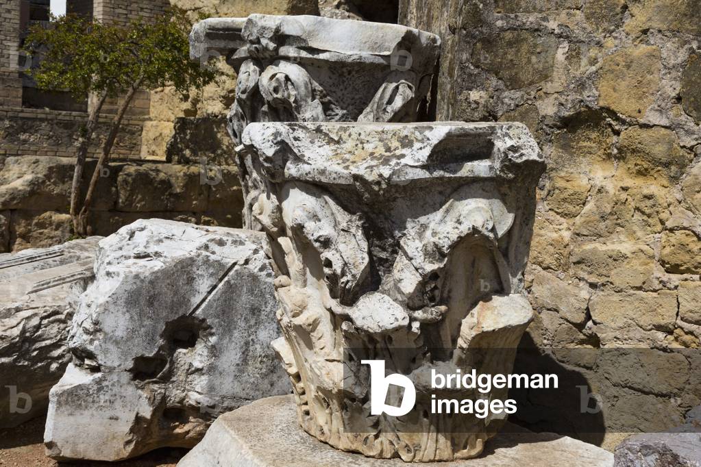 Corinthian capitals from fallen columns of the 1st century AD Roman temple, Cordoba, Spain (photo)