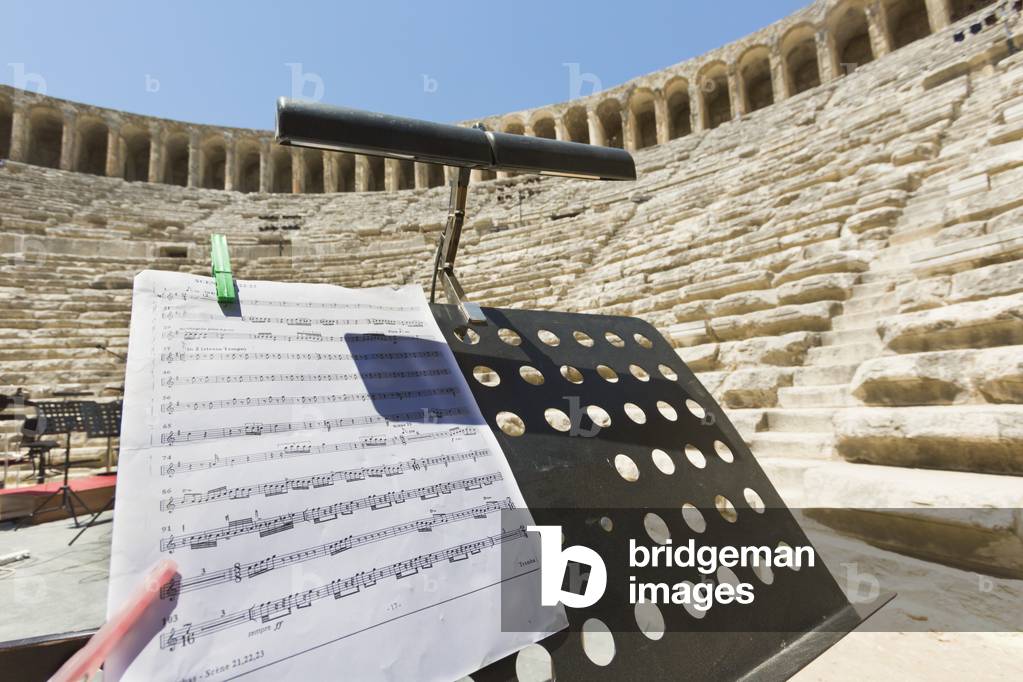 Aspendos, Antalaya Province, Turkey.  The Roman theatre which is still in use.  Orchestral equipment on stage in preparation for a performance.
