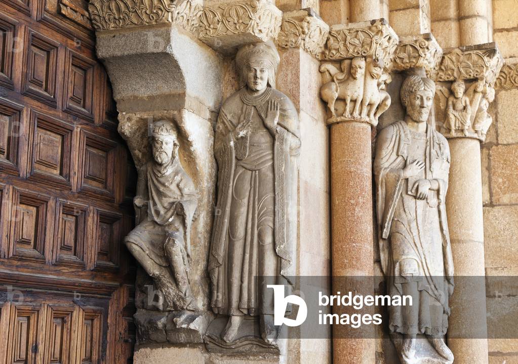 Avila, Avila Province, Spain. Figures by doorway of  Romanesque Basilica of San Vicente. (photo)