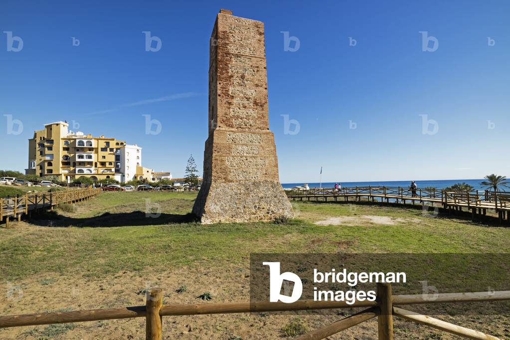 near Marbella, Costa del Sol, Malaga Province, Andalusia, southern Spain. 16th century monument Torre de los Ladrones (Thieves Tower)  amongst Artola sand dunes behind Artola Cabopino beach.