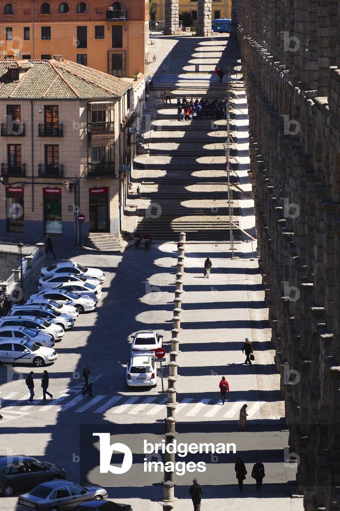 Segovia, Segovia Province, Spain. The Roman aqueduct and shadow.  UNESCO World Heritage Site. (photo)
