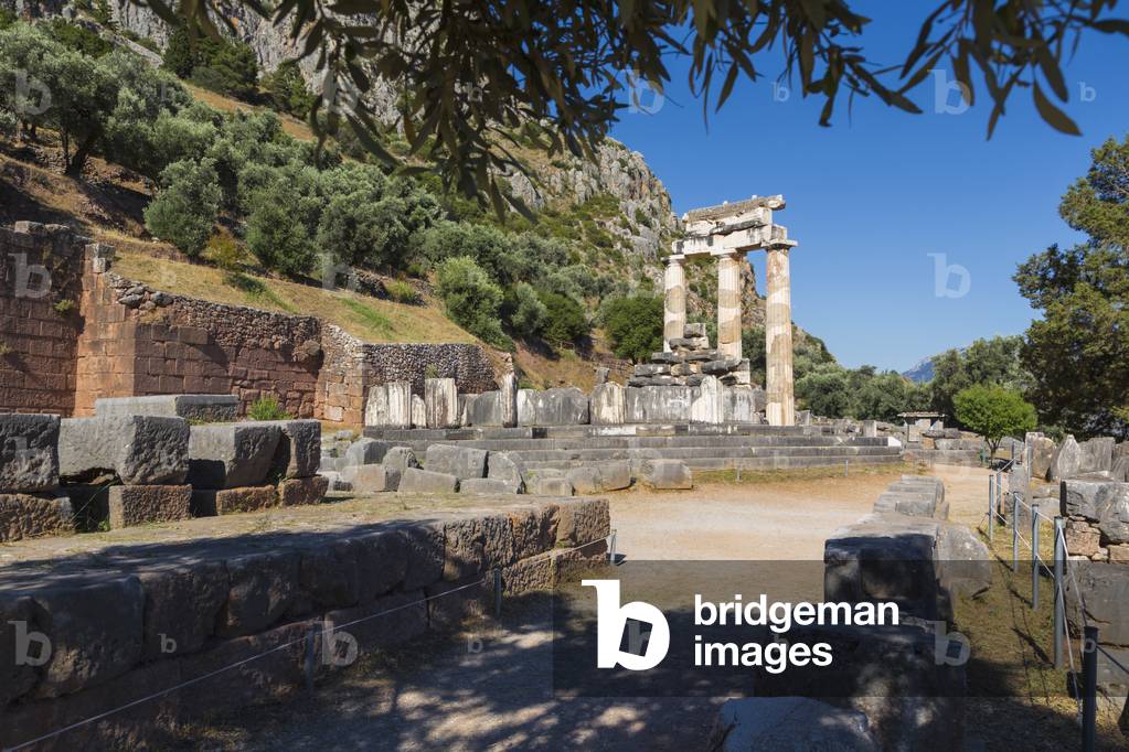 Delphi, Phocis, Greece.  The tholos, dating from around 380-360 BC, beside the Sanctuary of Athena Pronaia (photo)