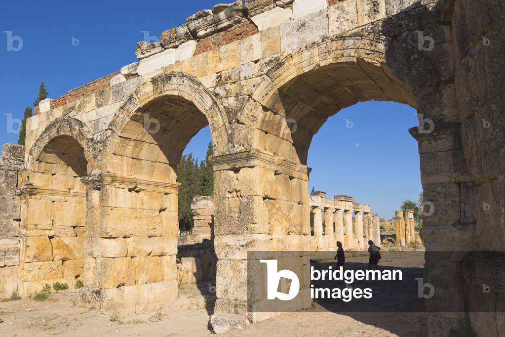 Hierapolis, Denizli Province, Turkey.  Ruins of the ancient city.  The northern Roman Gate, also known as the Domitian Gate, or Domitian Arch, or the Frontinus Gate.  Hierapolis is a UNESCO World Heritage Site.