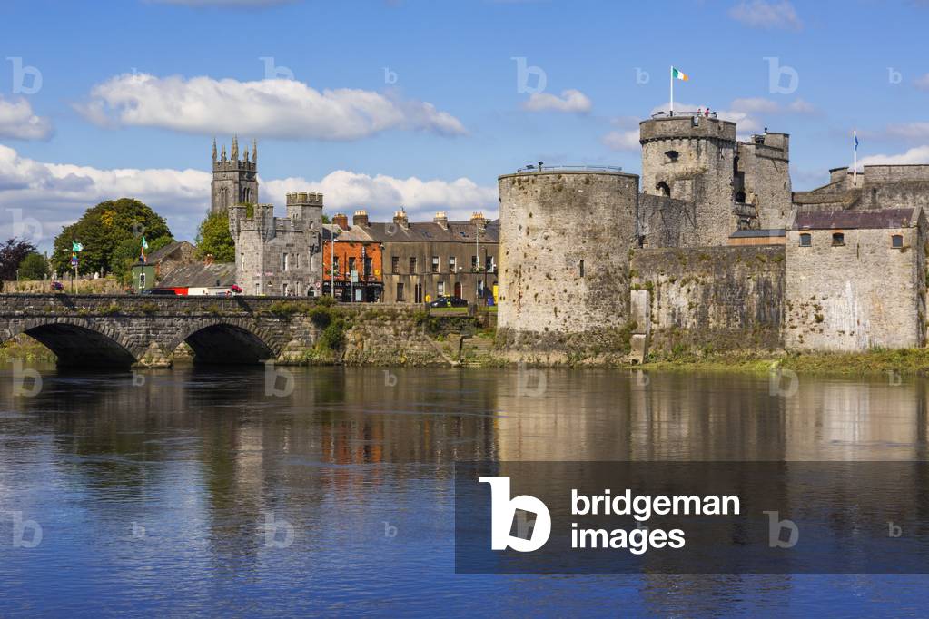 Limerick, County Limerick, Republic of Ireland.  Eire.  13th-century King Johns Castle seen across the River Shannon. (photo)