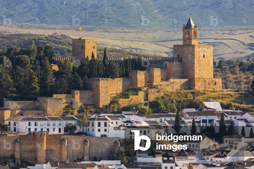 Antequera, Malaga Province, Andalusia, southern Spain.  View across the town from the Vera Cruz hill to La Alcazaba (citadel or castle). (photo)