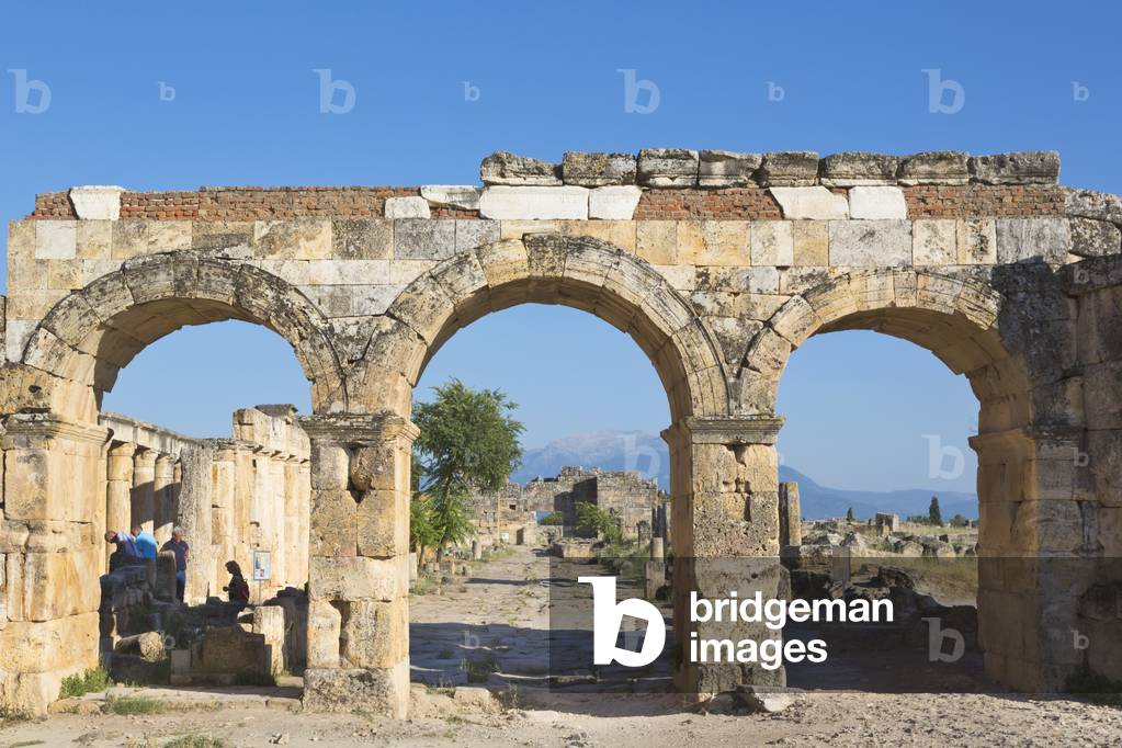 Hierapolis, Denizli Province, Turkey.  Ruins of the ancient city.  The northern Roman Gate, also known as the Domitian Gate, or Domitian Arch, or the Frontinus Gate.  Hierapolis is a UNESCO World Heritage Site.