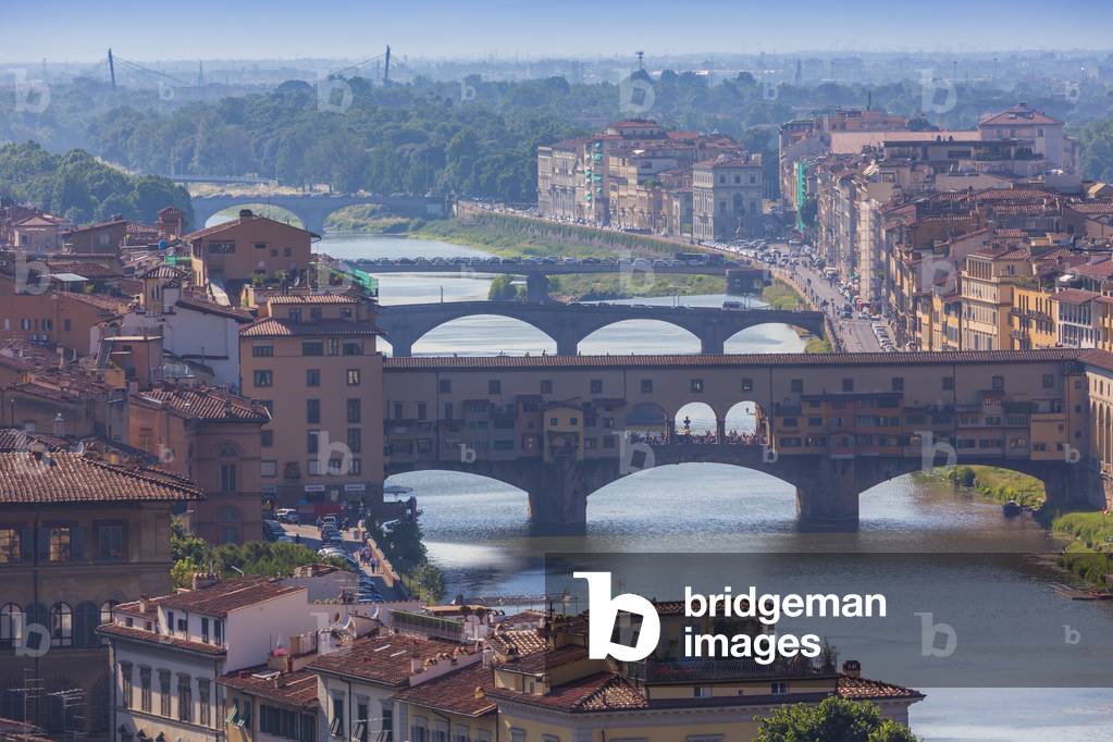 Florence, Tuscany, Italy.  View from Piazzale Michelangelo to bridges across Arno river.  Ponte Vecchio in foreground. (photo)
