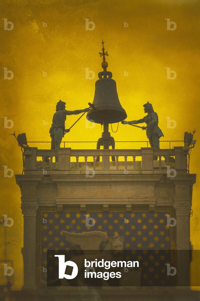 The two bronze figures known as the Moors atop the Clock Tower in St. Mark's Square and the winged lion of Venice, Venice, Veneto Region, Italy (photo)