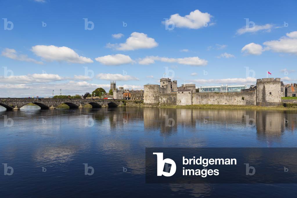 Limerick, County Limerick, Republic of Ireland.  Eire.  13th-century King Johns Castle seen across the River Shannon. (photo)