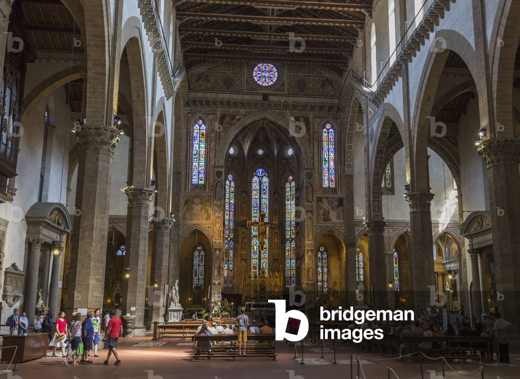 Florence, Tuscany, Italy.  Santa Croce Basilica.  View along length of nave to altar. (photo)