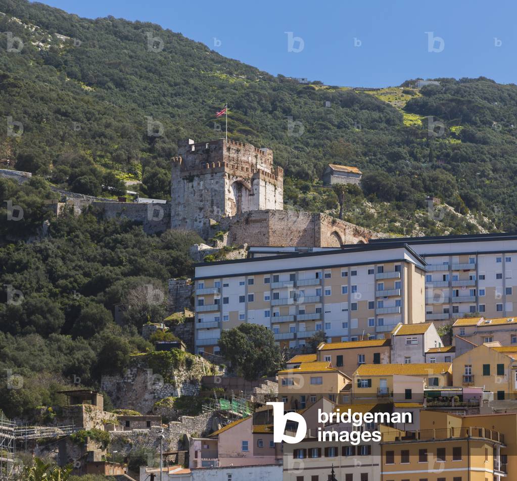 Gibraltar.  The Tower of Homage of the Moorish castle rising behind apartment blocks of Gibraltar town. (photo)