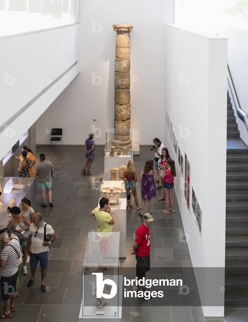 A restored column, found in the ruins, Museum of Roman ruins of Baelo Claudia at Bolonia, Cadiz Province, Costa de la Luz, Spain (photo)