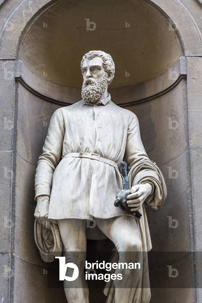 Florence, Florence Province, Tuscany, Italy.  Statue of Florentine goldsmith, sculptor and artist Benvenuto Cellini, 1500-1571, in Piazzale degli Uffizi (photo)