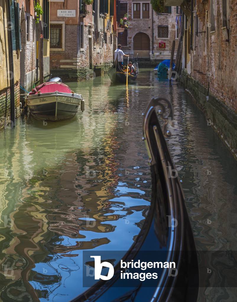 Gondola ride through one of the small canals, Venice, Veneto Region, Italy (photo)