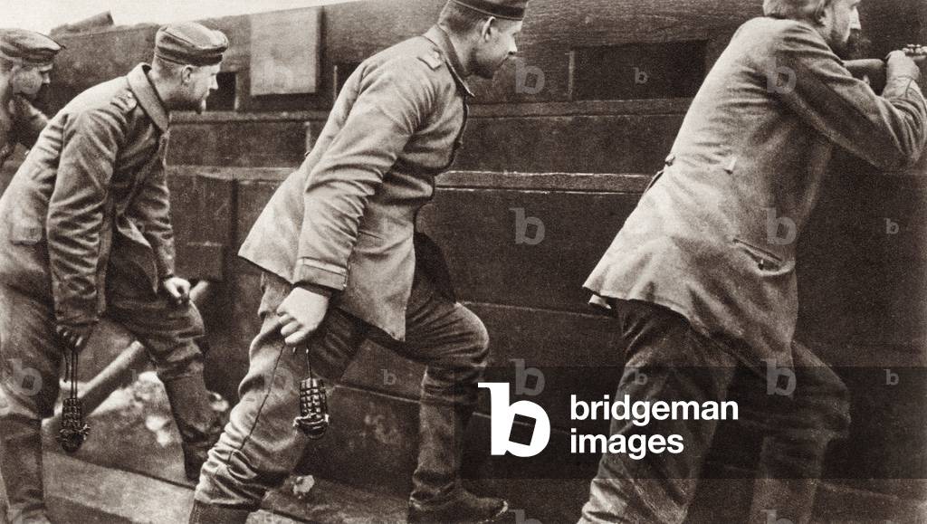 German soldiers in a trench holding hand grenades during World War I, from 'The Illustrated War News', published in 1915 (litho)