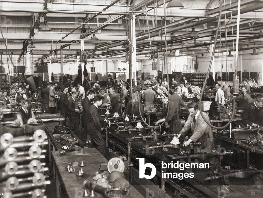 Workers on a production line, Interior Wolseley Motors, Birmingham, 1930s (b/w photo)