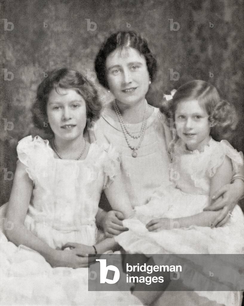 Queen Elizabeth with her daughters Princess Elizabeth, future Queen Elizabeth II, left and Princess Margaret, right, in 1937 (b/w photo)