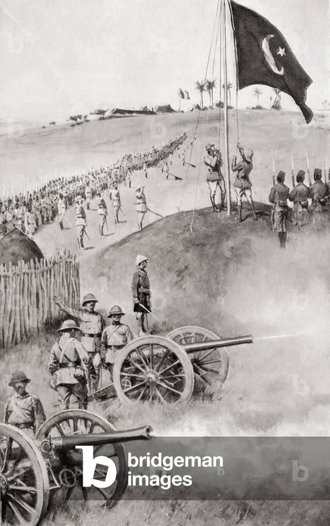 Hoisting the Egyptian flag at Fashoda, 1898, the climax of imperial territorial disputes between Britain and France in Eastern Africa.   From Field Marshal Lord Kitchener, His Life and Work for the Empire, published 1916.