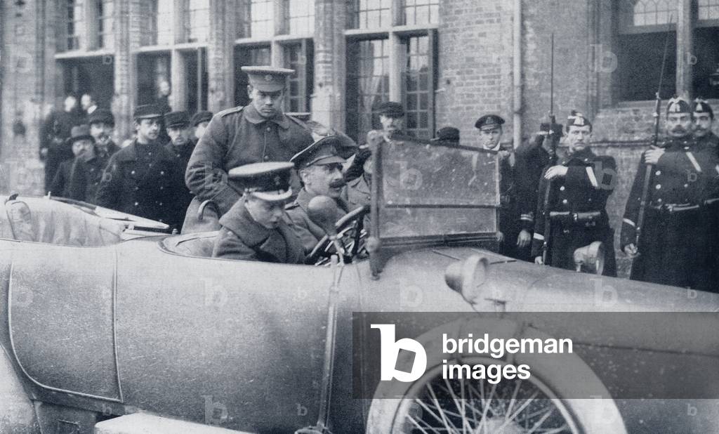 Lieutenant, The Prince of Wales, on the Western Front during World War I at the wheel of his car with Prince Alexander of Teck as passenger, from 'The Illustrated War News', published in 1915 (litho)