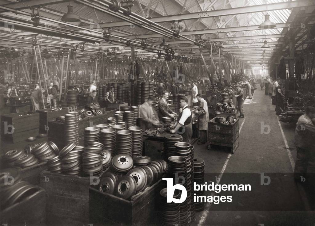 Workers  preparing hubcaps, Interior Wolseley Motors, Birmingham, UK, 1930s (b/w photo)