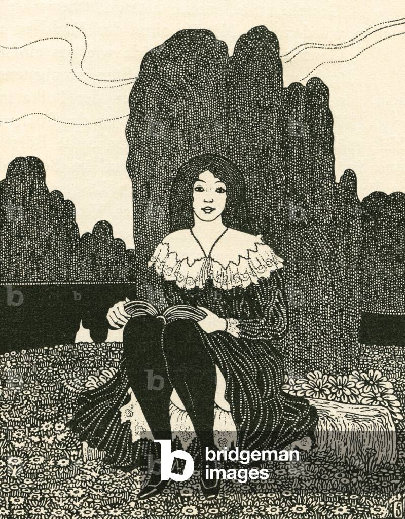 A young girl sat alone reading.
