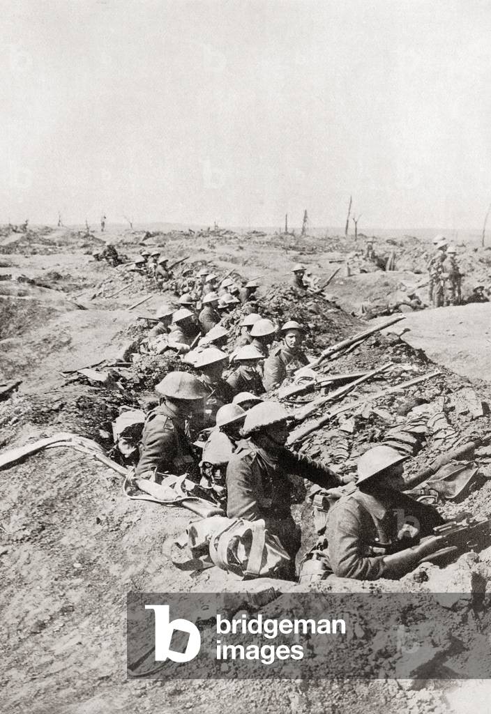 Soldiers awaiting the order to advance on the Somme Heights, France during World Ward One, from The Year 1916 Illustrated