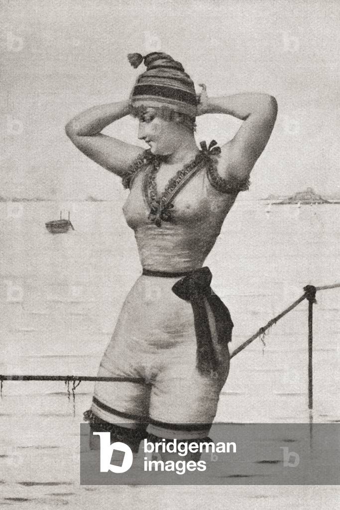 A woman bather in a provocative bathing suit in the late 19th century.