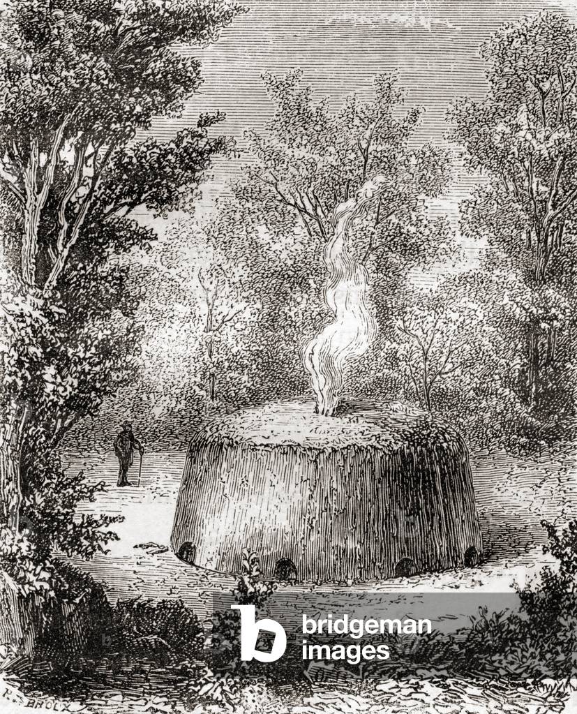 A charcoal kiln in the forest, after a 19th century drawing, from Les Merveilles de la Science, published c.1870 (engraving)
