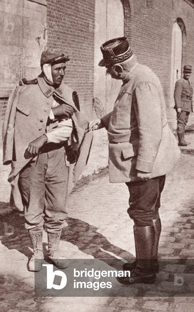 General Joffre aympathising with one of his wounded soldiers during World War I, from 'The Illustrated War News', published in 1915 (litho)
