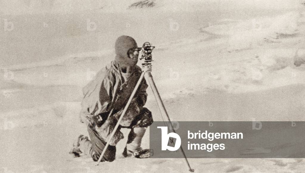 Captain Evans observing with the theodolite used by Captain Scott to fix position of the South Pole, from 'South With Scott' by E.R.G.R. Evans (b/w photo)