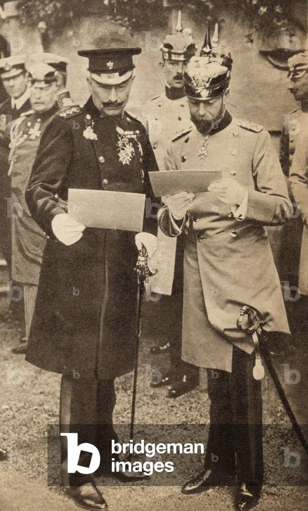 King George V and Kaiser Wilhelm II discussing operation orders in Germany in 1913, illustration from 'The Life of King George V', published c.1935 (b/w photo)