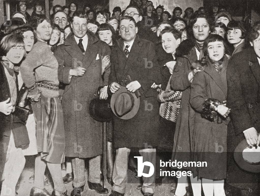 The Prince of Wales, later King Edward VIII, on a visit to Pell Street Club,Cable Street, East End, London, England in 1927.   From Edward VIII His Life and Reign.