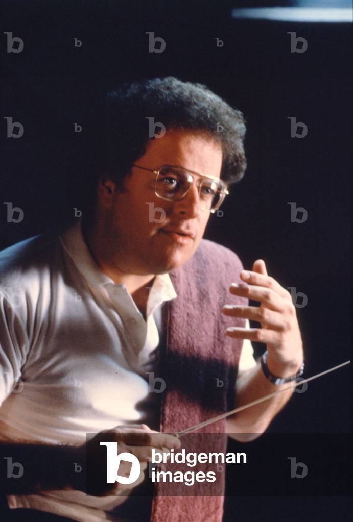 James Levine - portrait of American conductor holding a baton, b. 1943.