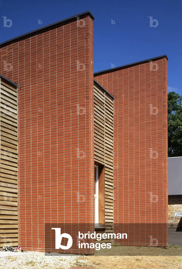 Brick and wood, architect Patrick Mellet.