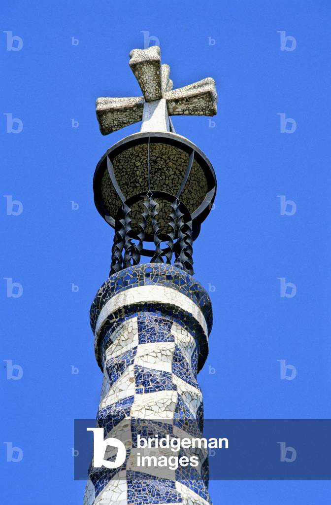 Detail of a trancadis checkered entrance pavilion of Parc Guell, Montana Pelada in Barcelona (Spain). Realisation 1903, architect Antoni Gaudi i Cornet (1852-1926).