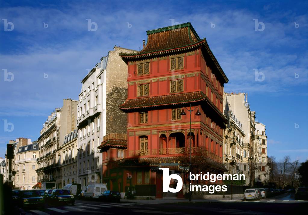 La Pagode, Place du Perou, Paris 8th arrondissement. A red pagoda in the heart of Paris: it is the seat of C.T. Loo et compagnie, the oldest Chinese antique dealer in Paris. This famous Chinese pagoda of Ching Tsai Loo, located near Parc Monceau at the corner of Rue de Courcelles and Rue Rembrandt (currently Place du Perou), was built between 1926 and 1928 with the collaboration of a French architect, Fernand Bloch, on the site of a former Louis Philippe mansion.