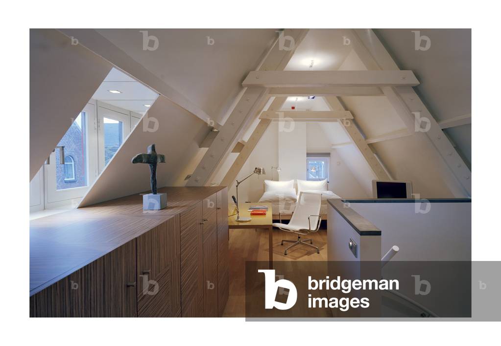 The hotel Kruisheren in Maastricht, Netherlands (Netherlands) realized by Satijn more architects and Vos interieur Mapertuus in 2005. Photography 15/03/06. In the heart of the historic centre of Maastricht, the 15th century Kruisherenklooster was inaugurated as a hotel in May 2005. In a very contemporary and innovative style and furniture by the Dutch interior architect Henk Vos (Maupertuus) and the famous lighting architect Ingo Maurer.