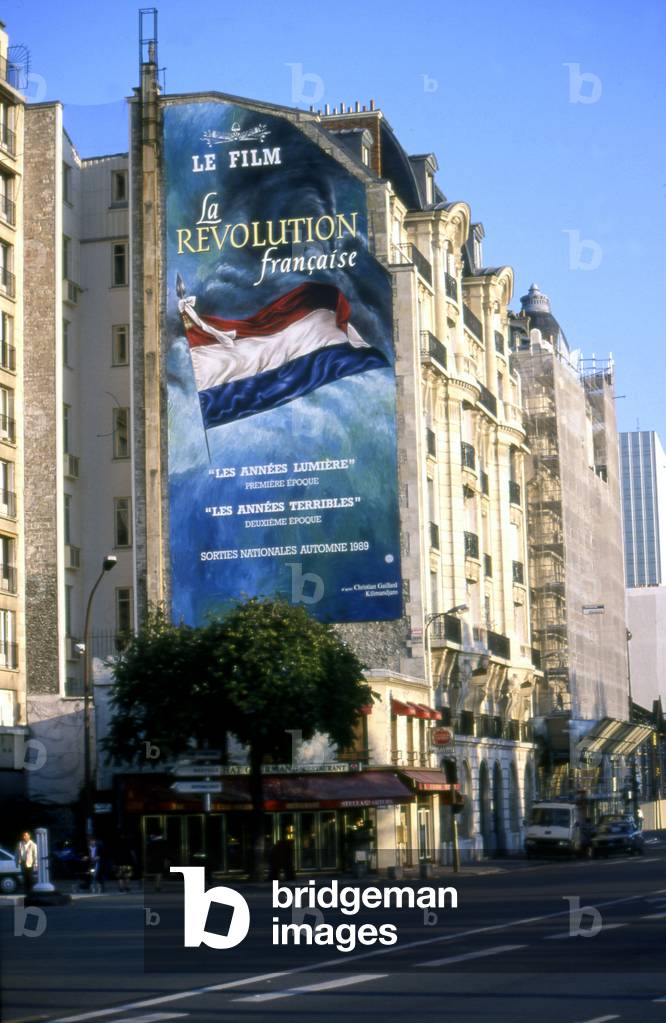 An advertising canvas stretched on a building, Place Mazas in Paris 12th arrondissement.